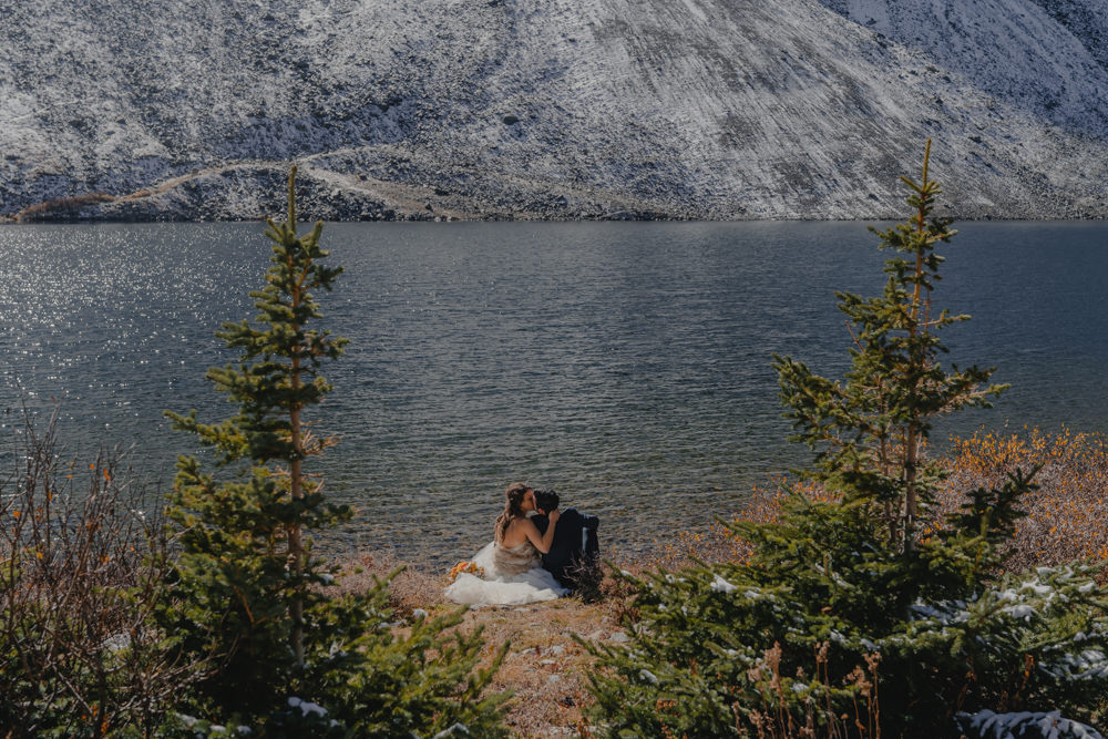 couples portrait at Blue Lakes Breckenridge on their elopement day