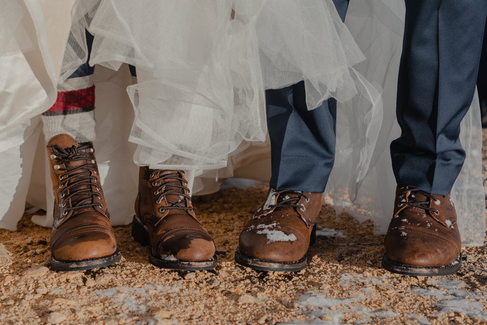 detail shots of couples boots during their elopement at loveland pass